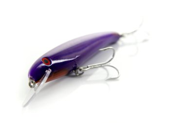 Tuna fishing lure purple over white background clipart
