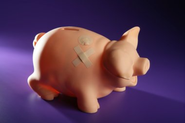 Hurted savings piggy bank clipart