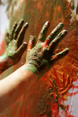 Children artist hands painting colorful clipart