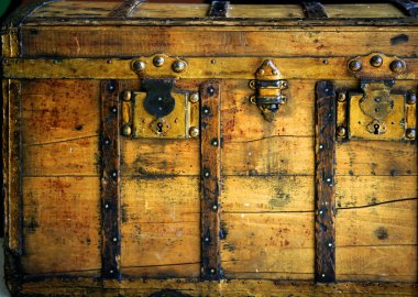 Old wooden chest, trunk in golden color clipart