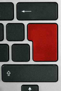 Keyboard with enter key in red color clipart