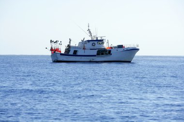 Mediterranean longliner boat working in Alicante clipart