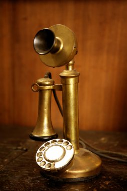 Vintage golden brass spanish old telephone clipart