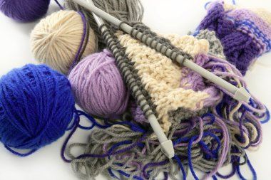 Knitting tools with wool thread balls clipart