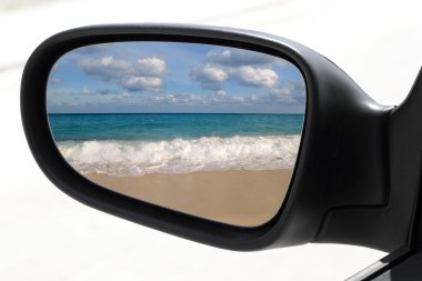 Rearview car driving mirror tropical caribbean beach clipart