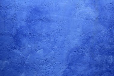 Grunge blue painted wall texture background clipart