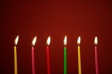 Colorful birthday candles in a row clipart