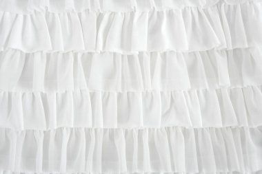 Pleated skirt fabric fashion in white closeup clipart