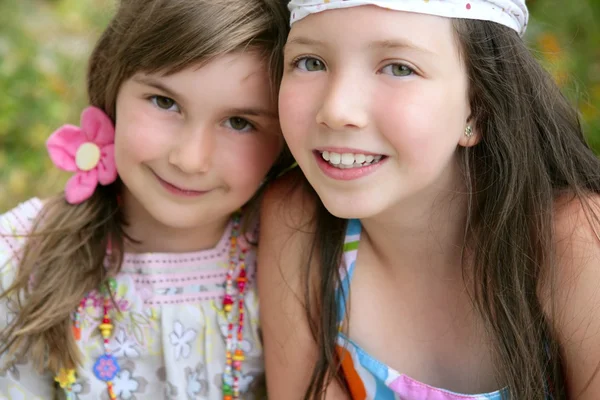 Closeup portrait of two little girl sisters — Stock Photo, Image