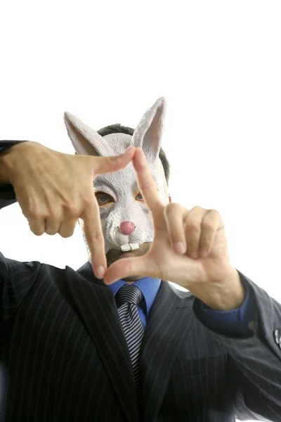 Uomo d'affari con divertente maschera di coniglio — Foto Stock