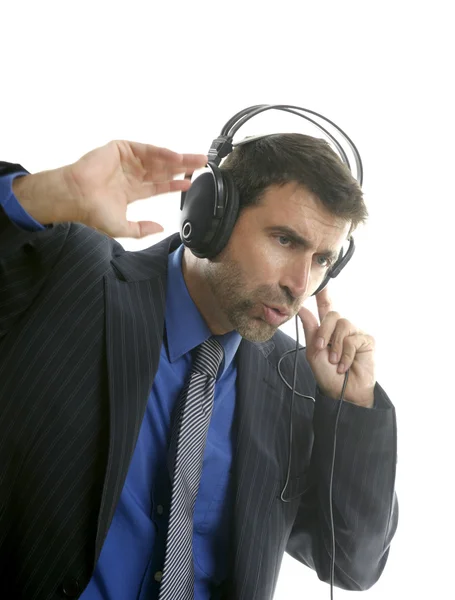 Businessman hearing, singing music, headphones — Stock Photo, Image
