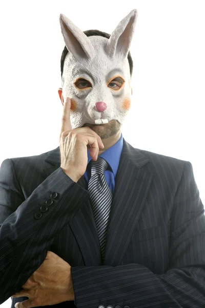 Бизнесмен в смешной кроличьей маске — стоковое фото