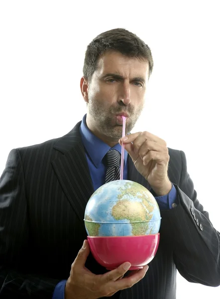Businessman drinks world, power leader metaphor — Stock Photo, Image