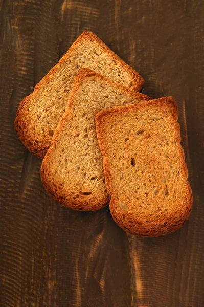ชิ้นขนมปังอบ — ภาพถ่ายสต็อก