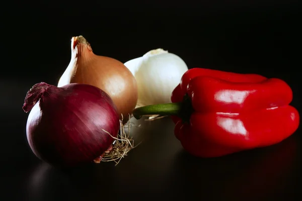Vegetables still with onion and pepper — Stock Photo, Image