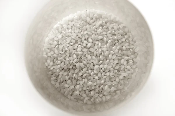 Fehér rizs közelről textúra. alnyomat-minta — Stock Fotó