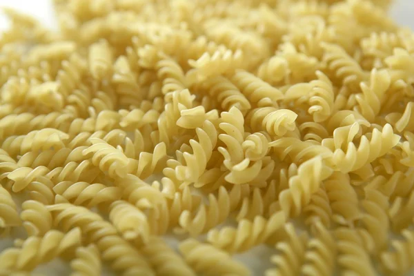 Italian spiral pasta texture — Stock Photo, Image