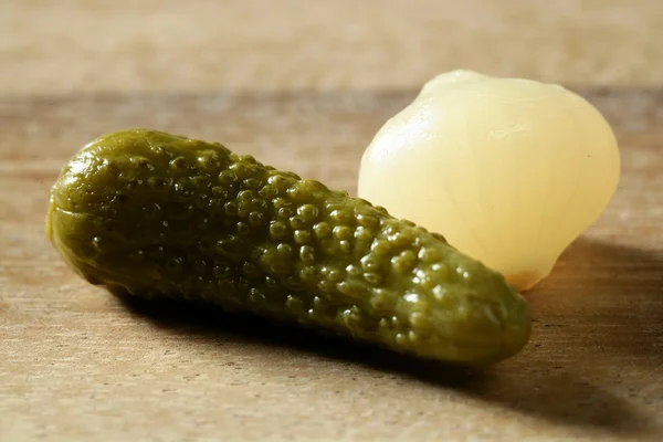 Green pickles macro studio shot, textured skin — Stock Photo, Image