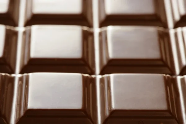 Chocolate brown bar, squares texture — Stock Photo, Image