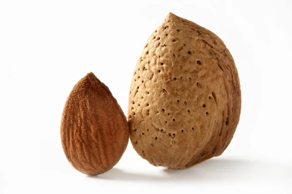 Almond macro image over white background — Stock Photo, Image