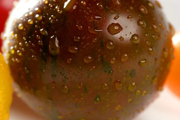 Little cherry brown color tomato — Stock Photo, Image