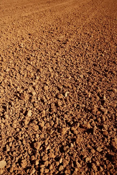 Arcilla roja agricultura texturizada suelo — Foto de Stock