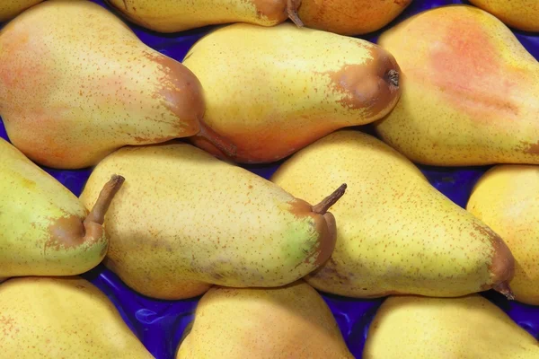 Päron frukter i rader marknaden bakgrundsmönster — Stockfoto