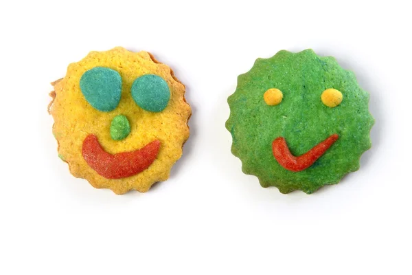 Engraçado sorrisos caras biscoitos colorido forma redonda — Fotografia de Stock