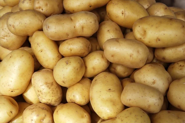 Aardappelen ruwe patroon in de markt — Stockfoto