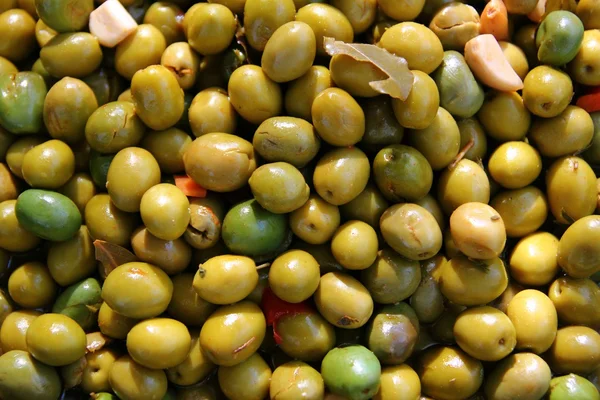 Olives en saumure marinade texture de fond — Photo