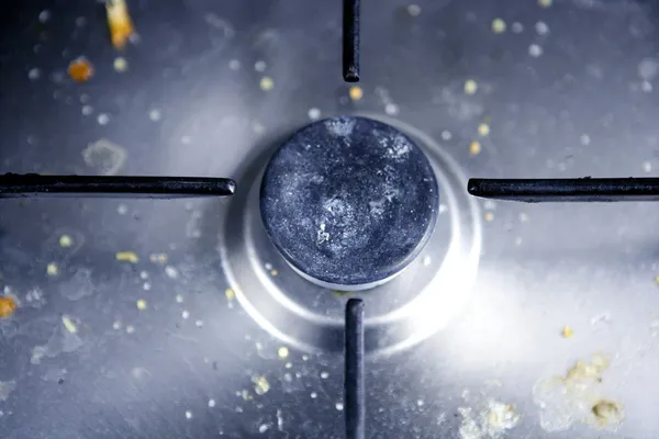 Cozinha suja em macro de aço inoxidável — Fotografia de Stock