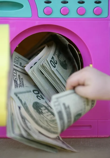 Cleaning black money dollar metaphor — Stock Photo, Image
