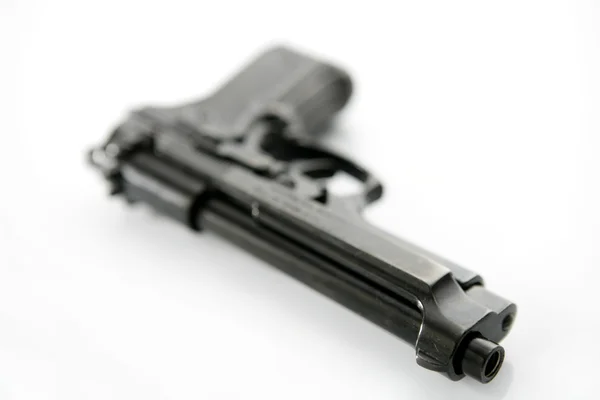Svart hand pistol pistol över vit bakgrund — Stockfoto