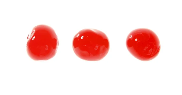 Τρεις κεράσι, κόκκινα φρούτα μακροεντολή σε λευκό — Φωτογραφία Αρχείου