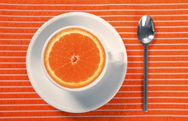 Healthy breakfast cup of orange instead caffeine — Stock Photo, Image