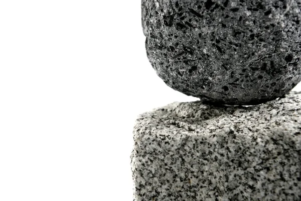 Вулканическая Пумице, над гранитным кирпичным камнем — стоковое фото
