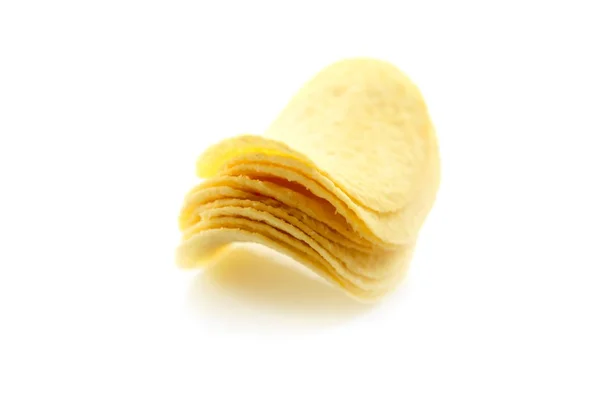 Potato chips satacked op witte achtergrond — Stockfoto