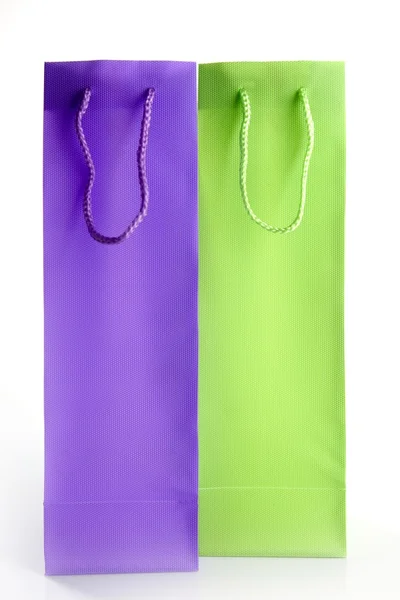 Two tall shopping bangs, purple and green — Stock Photo, Image