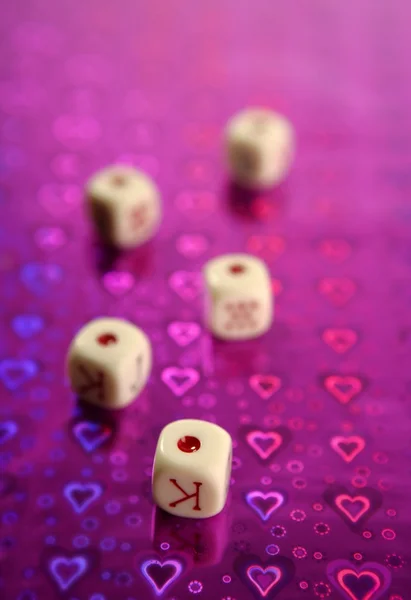 Poker dices over colored background — Stock Photo, Image