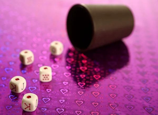 Poker dices over colored background — Stock Photo, Image
