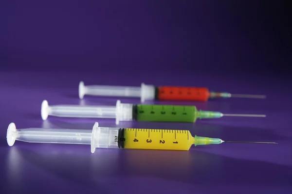 Colorful syringes set, health, medicine, genetics — Stock Photo, Image