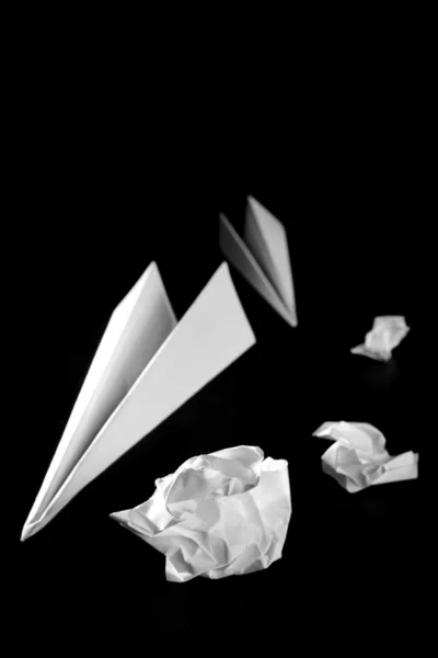 Trash paper and air plane — Stock Photo, Image