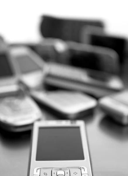 Assorted mixed mobile phones — Stock Photo, Image