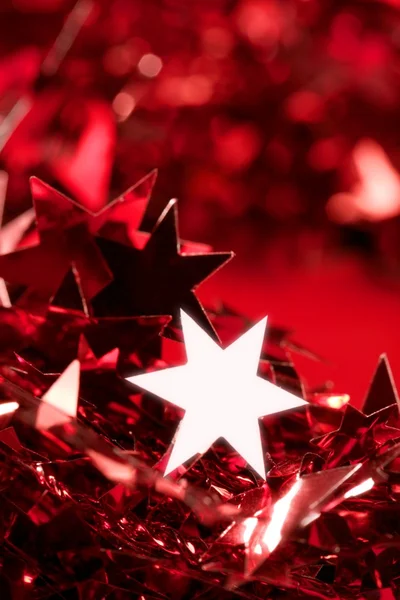 Decoração estrela de Natal ainda no fundo vermelho — Fotografia de Stock