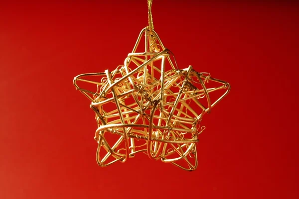 Natal decoração dourada com estrela de ouro — Fotografia de Stock