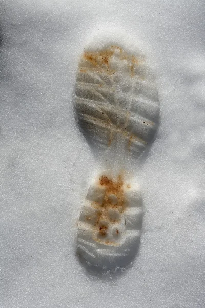 Witte sneeuw bodem met één boot voetafdruk — Stockfoto
