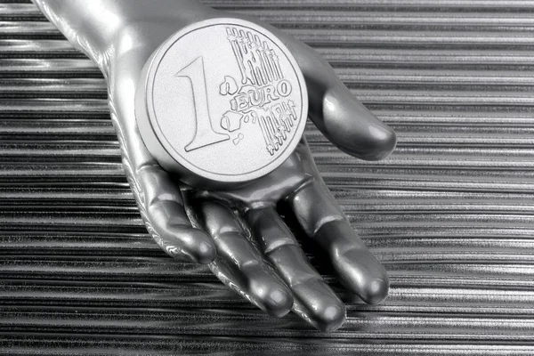 Moneda de plata euro de plata metálica futurista mano — Foto de Stock