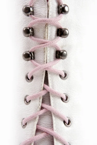 Closed white long boot pink thread — Stock Photo, Image