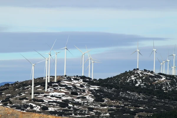 Electric aerogenerator windmills snow winter — Stock Photo, Image