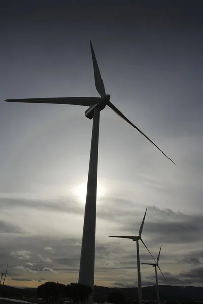 Aerogenerator electric windmill cloudy sky — Stock Photo, Image